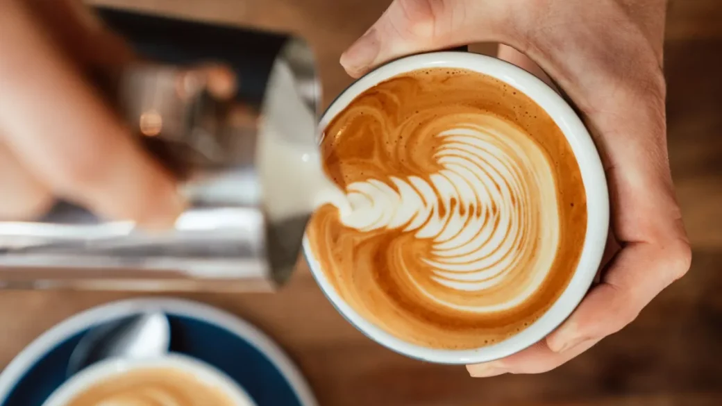 A balanced espresso shot pouring in a steady thin stream