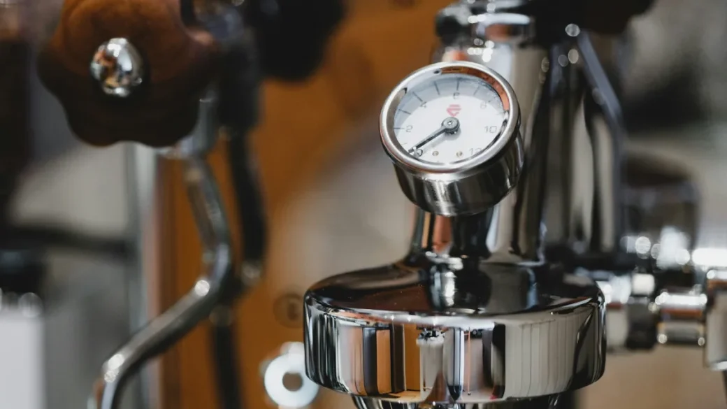 The inside of a single-boiler espresso machine with the case removed