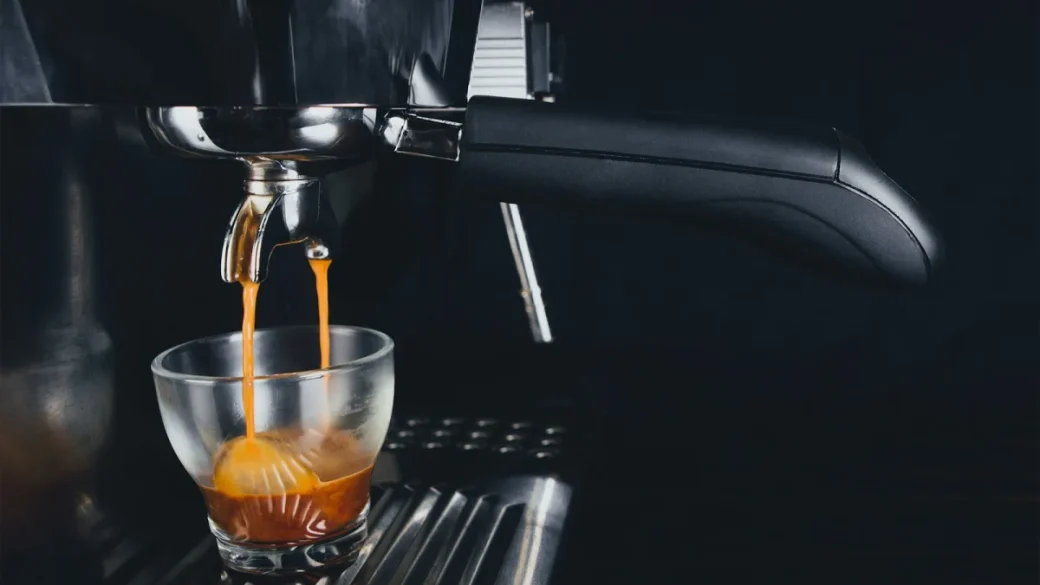 A double-spout portafilter with the basket seated inside