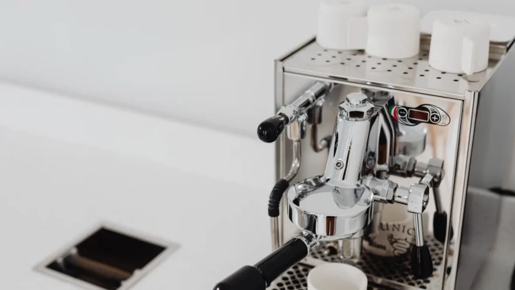Limescale buildup restricting an espresso machine steam path