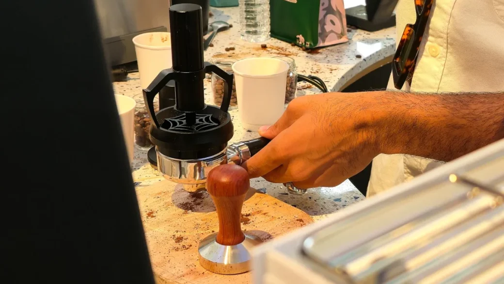 An ULKA EP5 vibratory pump with brass barb fittings