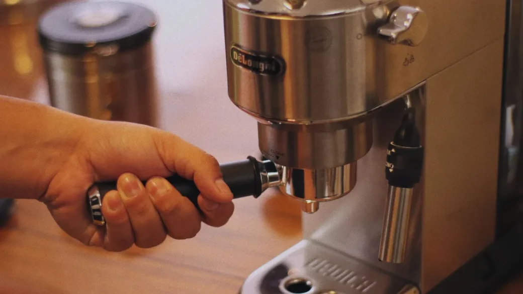 Reseating the water tank on a De'Longhi to clear an air pocket